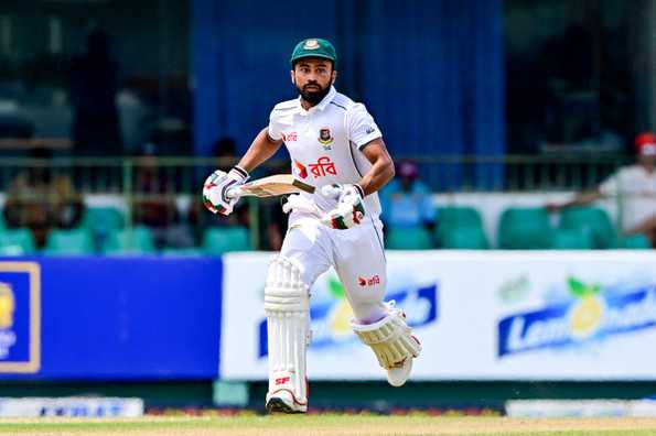 Shadman leads Bangladesh with a score of 46 on rain-affected day.
